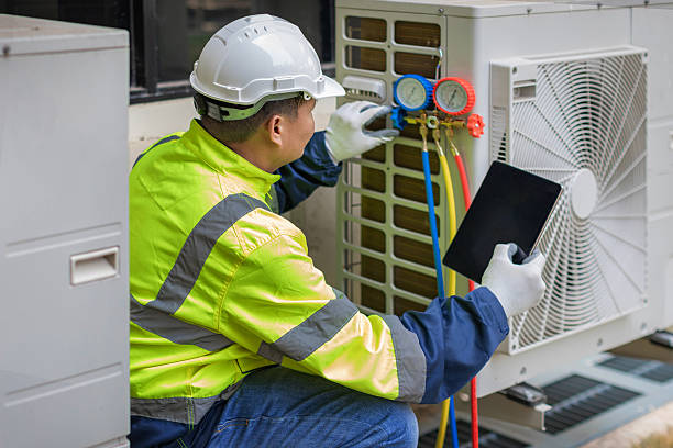 Professional Air Conditioning Repair technician working in Barrington, NH